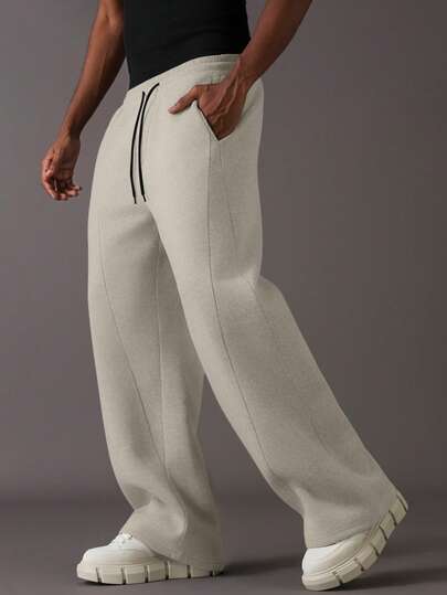 STYNVO بنطلون رياضي رجالي بخصر مربوط بسحاب، لون أحادي