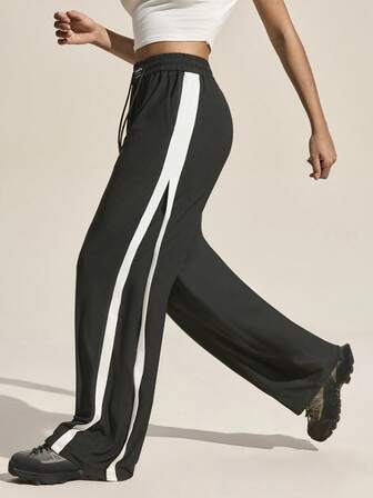 Exploreva Pantalones deportivos de mujer con cintura con cordón y parches de colores contrastantes para uso al aire libre