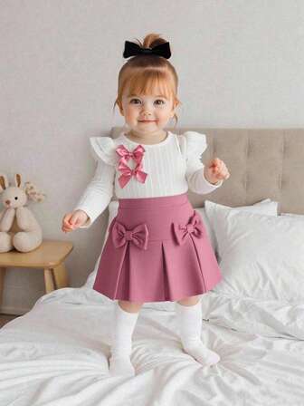 SHEIN 女婴甜美可爱蝴蝶结装饰长袖白色上衣搭配粉色百褶裙休闲简约T恤套装
