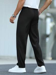 Manfinity Mode Herren Business Pendler schwarze Webstoff Gerade Bein Anzughose mit Reißverschluss, Herren einfarbige plissierte Taschen Casual/Business Anzughose - Schwarz - Übersicht 2