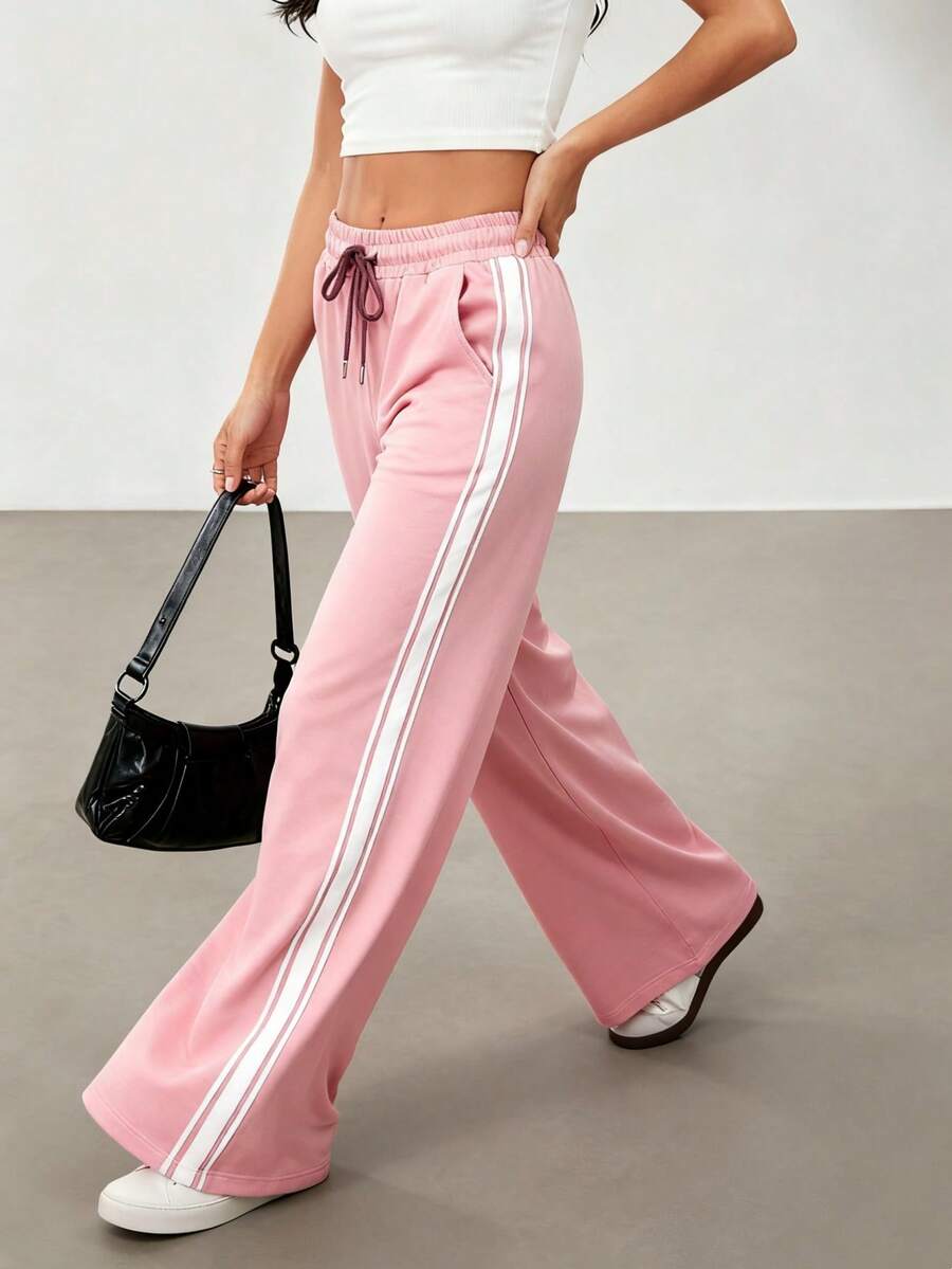 Pantalones casuales de color negro con rayas laterales, unicolor y de moda - Rosa - Ver 1