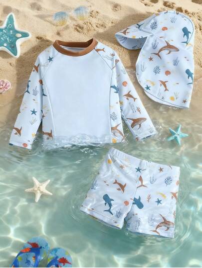 SHEIN Bộ 3 món quần short dài tay in hình cây dừa cho bé trai/bé gái đi nghỉ hè thường ngày kèm mũ chống nắng, đồ bơi phù hợp mặc mùa xuân/hè, ở nhà, đi chơi, du lịch, đi biển, hồ bơi, tiệc tùng
