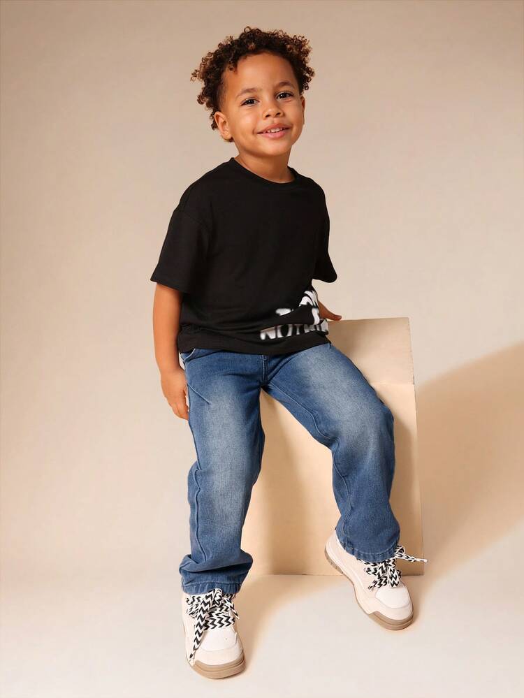 Jeans in denim dalla vestibilità rilassata con lavaggio sbiadito