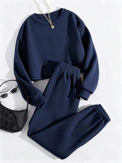 GlowEve CURVE Conjunto de sudadera y pantalón de polar liso para mujer, talla grande, informal, con cuello redondo, azul marino