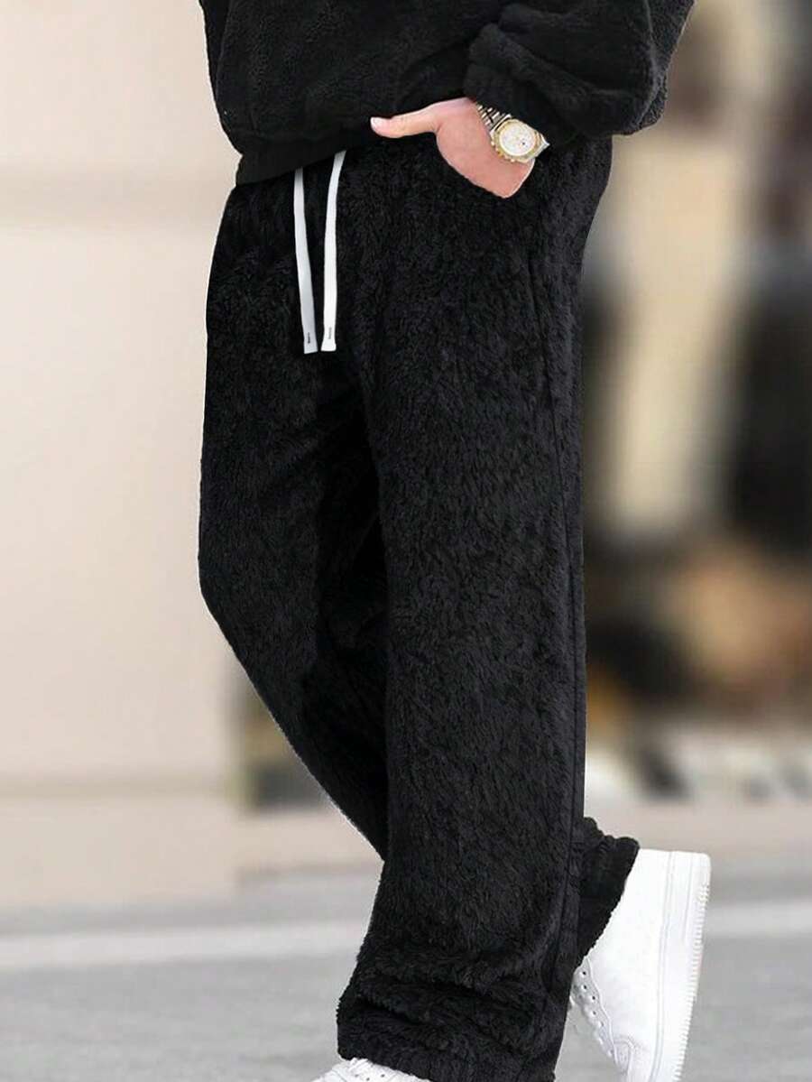 Manfinity Homme 男士休闲宽松直筒运动裤，适合日常休闲穿着、周末外出、旅行、与朋友聚会等场合。这款裤子是男士衣橱中不可或缺的百搭单品，也是送给男友或丈夫的绝佳礼物。 - 黑色 - 查看 1