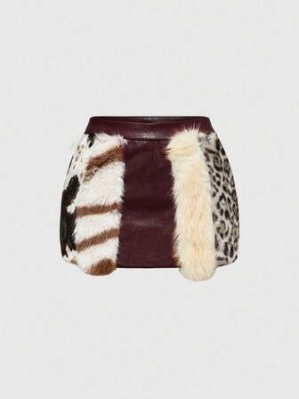 Falda mini de cintura baja de piel sintética con estampado animal y parches en estilo hippie vintage "Millennium Babe" para mujeres