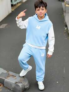 SHEIN 2pcs/Set Young Boy Autumn Outfit,Includes Hooded Long Sleeve T-Shirt And Contrast Color Splicing Sports Shorts,Sporty Design For Daily Wear,Vacation - Blue - View 1