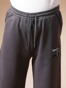 SUMWON Tween Boys Relaxed Fit Graphic Sweatpants With Sport Label Patch And Urban Essentials Leg Text Vacation - Dark Grey - View 7