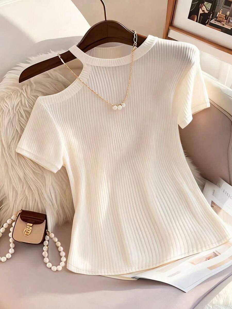 Franclia Áo thun nữ tay ngắn dáng ôm, màu trơn, vai bất đối xứng, áo dệt kim gân - Màu be - Xem 1