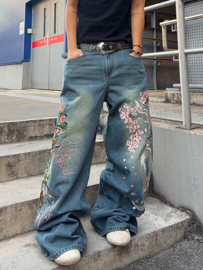 Jeans larghi con vestibilità ampia e ricamo di mostri sulla tasca, per uomo