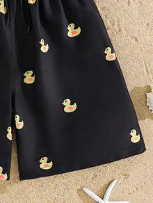 SHEIN Teen Boy Casual Cartoon Duck Print Loose Swim Trunks, Suitable For Summer