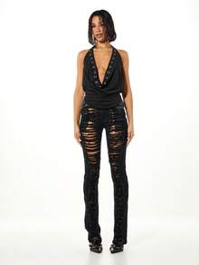 SUMWON WOMEN Distressed Ripped High Rise Skinny Flare Leg Denim Jeans With Extreme Shredded Details And Grunge Aesthetic For Street Style Edgy Fashion - Black - View 3