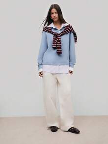 Áo nỉ dáng rộng với cổ và viền áo kẻ sọc lấy cảm hứng từ áo sơ mi, tay dài và phom dáng thoải mái. Phong cách thường ngày và trẻ trung, lý tưởng cho kỳ nghỉ xuân, sinh nhật và mùa xuân hè. - Màu xanh lam - Xem 5