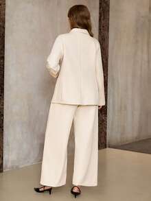 Roveilla 大码女士优雅法式浪漫西西里风休闲套装，适合工作、度假、下午茶、圣诞派对等场合，纯色西装外套，双排扣金属纽扣，修身长袖外套搭配松紧腰长裤，春秋冬三季皆宜。这款套装包含两件套西装外套、两件套西装、女士西装、女士套装、西装外套和长裤，尽显优雅气质。 - 杏色 - 查看 2