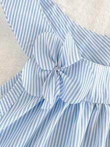 SHEIN Vintaside Kids Young Girl Round Neck Sleeveless Striped Casual Dress With 3D Floral Decor, Spaghetti Straps And Halter Neck, In Blue And White.
Perfect For Parties, Casual Outings, And Vacations. This Versatile One-Piece Dress Brings Comfort And Style To Young Girls In Spring And Summer. Little Girls Linen Dress Kids Dresses Dusty Blue Kids Dress Cute Dresses For Young Girls 3d Bow Ruffle Strap Casual Dress - Apricot - View 5