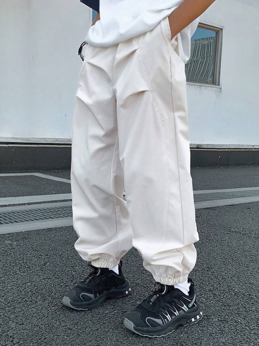 男童休闲韩版宽松抽绳纯色工装裤,适合通勤、上学、日常休闲、旅行、运动,春夏秋冬皆宜。 - 卡其色 - 查看 1