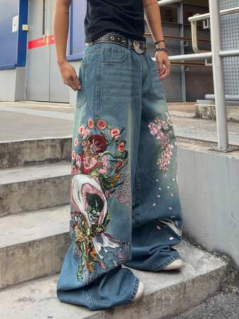 Jeans larghi con vestibilità ampia e ricamo di mostri sulla tasca, per uomo