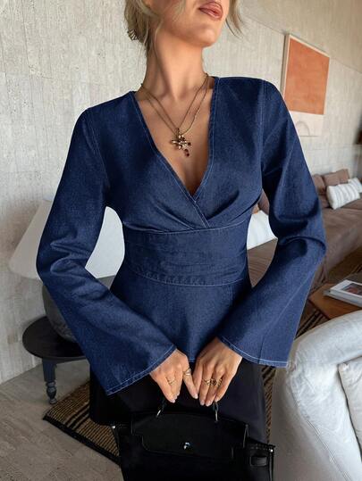 Firerie Women's Crossover V-Neck Flare Sleeve Cinched Waist Fashionable Denim Blouse,Denim Shirt Top,Deep V Neck Denim Shirt,V Neck Fitted Denim Shirt,Flare Sleeve Denim Shirt,Office Denim Shirt,Versatile Office Denim Top,Vacation Denim Shirt,Holiday Casual Denim Top,Old Money Style Denim Shirt,French Style Denim Shirt,All Season Denim Shirt,Valentine's Day