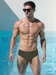 Manfinity Swimmode Men's Solid Color Beach Vacation Casual Swim Trunks