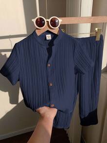 SHEIN 2pcs/Set Baby Boy/Girl Comfortable Casual Daily Textured Fabric White Short Sleeve Shirt And Pants Set, Suitable For Indoor, Outdoor, Daily, Sports, Play, Party, Photo Shoot, Holiday, Festival In Spring/Summer - Navy Blue - View 1