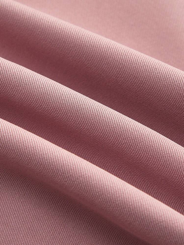 Minigonna asimmetrica rosa con avvolgimento e dettaglio a doppio bottone, stile carino