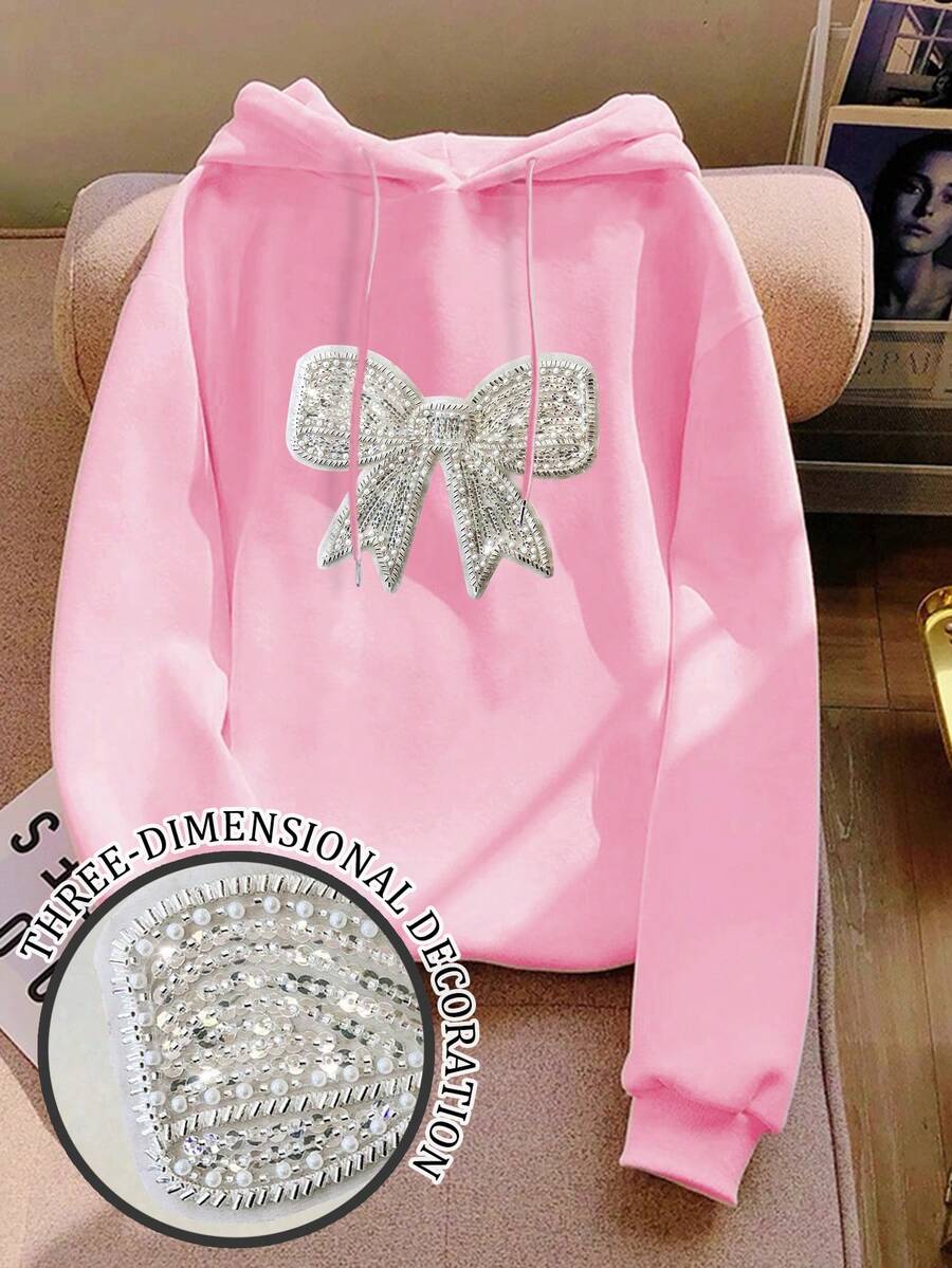 SHEIN 重工蝴蝶结串珠饰品粉色连帽女毛绒毛衣，甜美可爱，适合秋冬季，蝴蝶结饰品，串珠装饰，现在流行，时尚T恤，漂亮的运动衫，兄弟姐妹礼物，姐妹礼物，妈妈礼物，母亲节礼物，休闲简约时尚上衣 - 粉色 - 查看 1