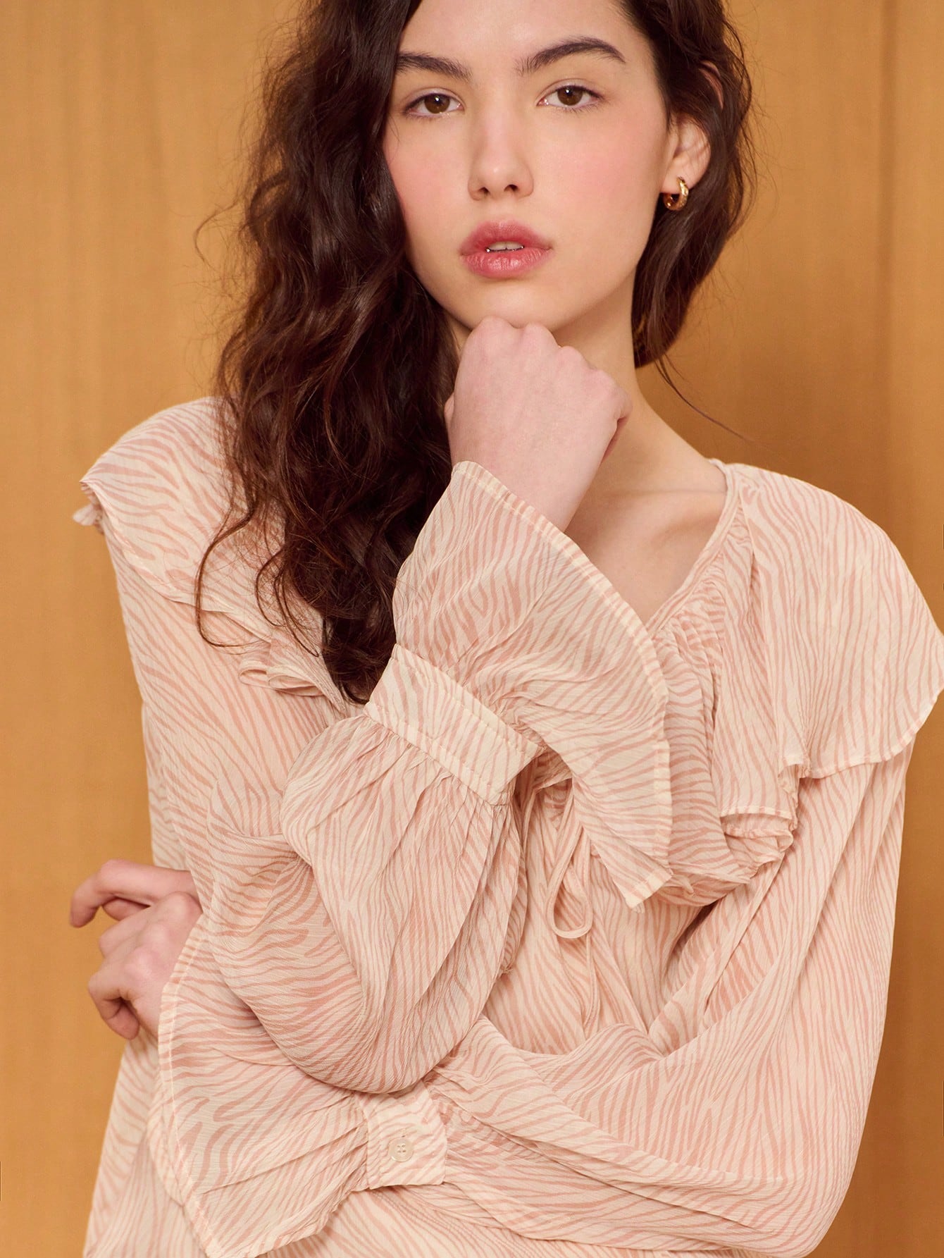 Feminine Pink Zebra Ruffle Top With Flared Long Sleeves