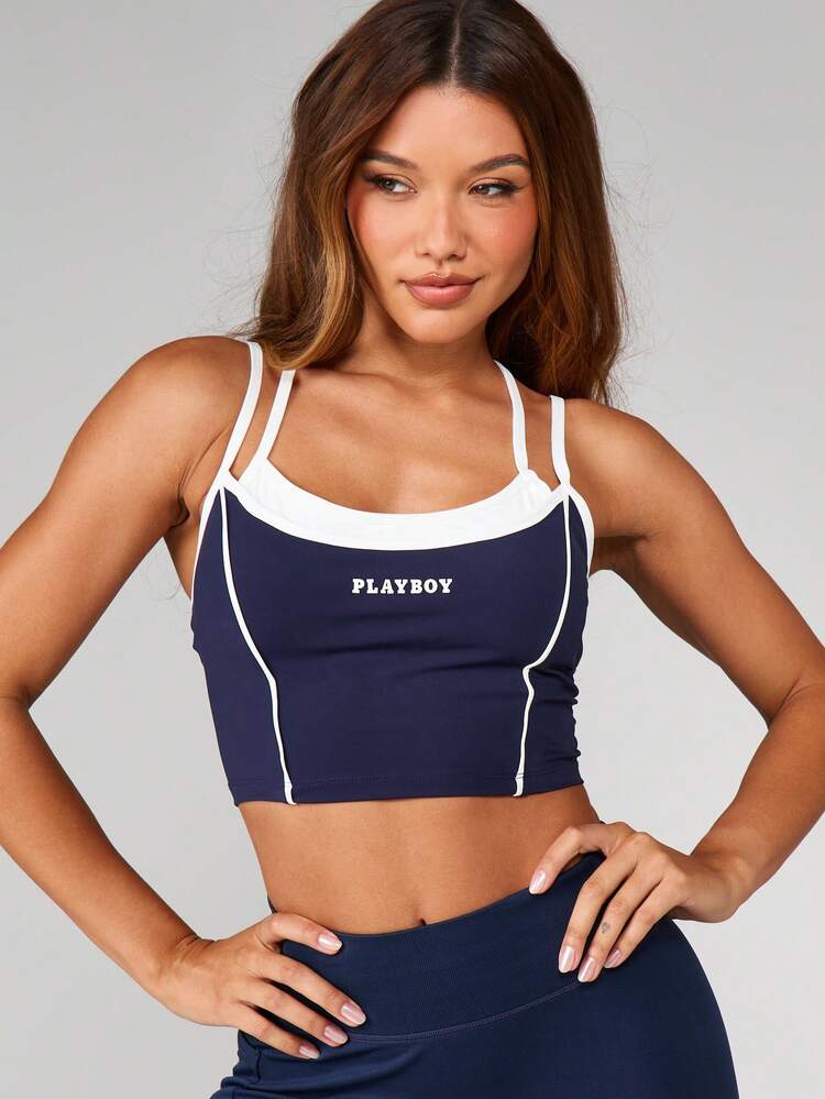 Missguided x Playboy 대비되는 흰색 트림과 로고 디테일이 있는 네이비 스트래피 백 스포츠 브라 운동 운동 탑