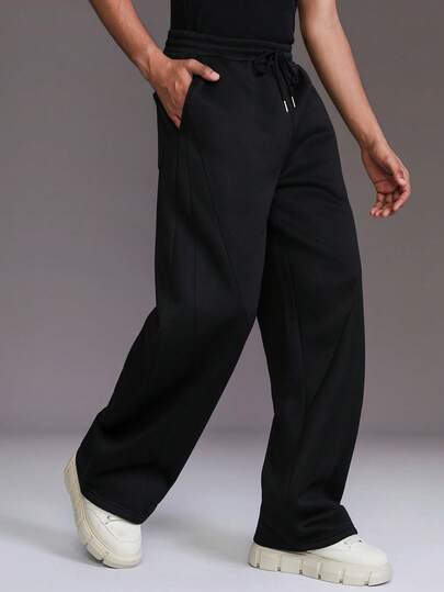 STYNVO Pantalon de survêtement casual ample avec poche et taille élastique pour homme