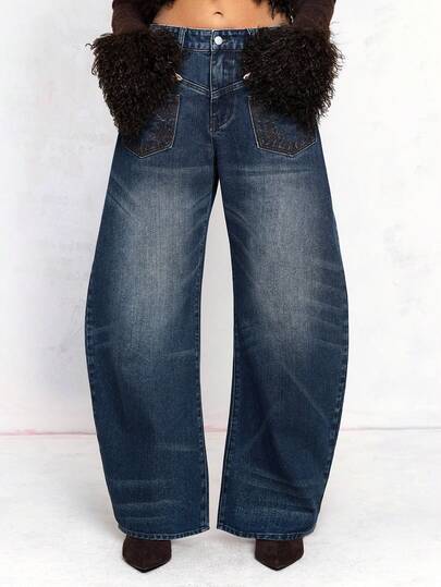 ROMWE Avant Jeans maxi desgarrados de talle bajo, pierna ancha y ajuste holgado, con diseño asimétrico y desconstructed, con bordados, estilo American Baddie