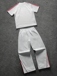 PAVTROS 男士街头运动套装（2件套）：短袖T恤，弹力腰抽绳长裤，针织长裤，几何撞色设计，运动休闲，球衣，足球服套装，运动健身，休闲户外，街头运动，男友礼物，节日礼物 - 白色 - 查看 2