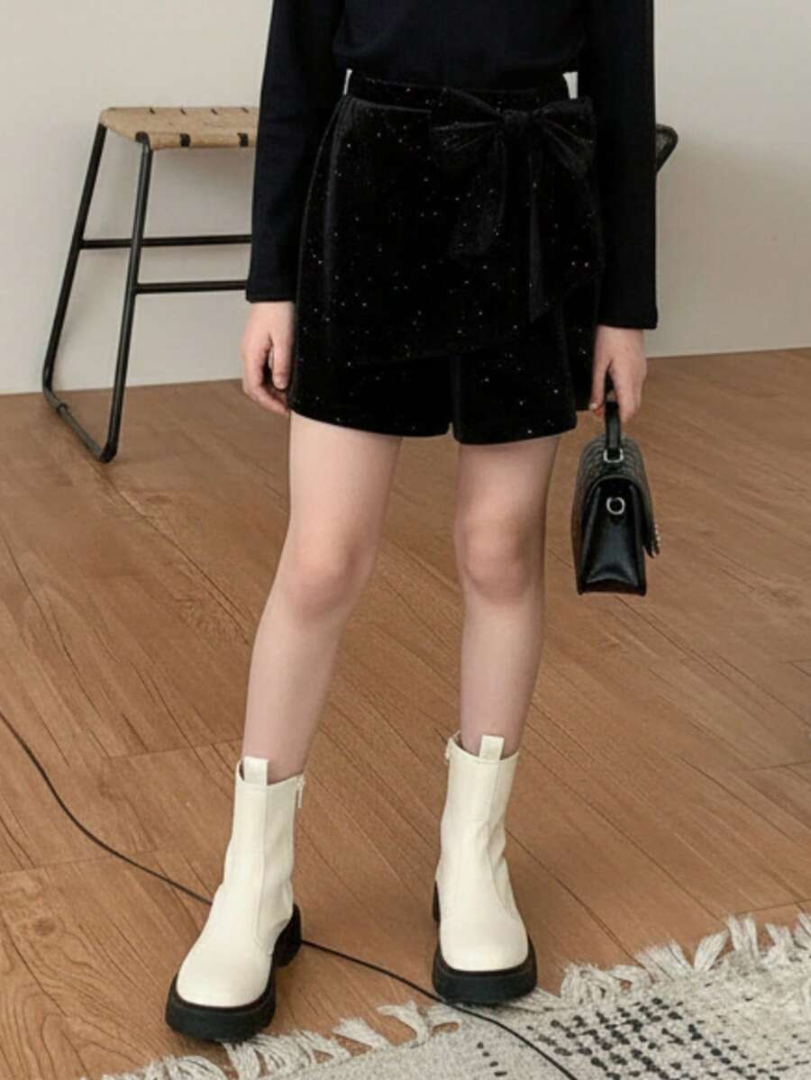 Falda corta shorts skort de terciopelo brillante para niñas con un bonito lazo decorativo y falda de fiesta brillante. - Negro - Ver 1