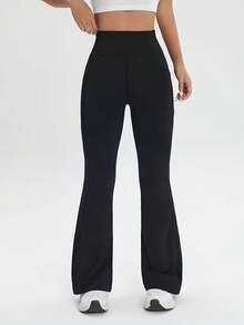 1 par de leggings de yoga para mujer, diseñados para realzar la figura y levantar los glúteos, adecuados para el uso diario, el entrenamiento físico y las actividades deportivas. - Pantalones acampanados 9115LBK - Ver 4