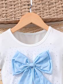 Sparklyn Đầm cho bé gái tuổi teen, áo dệt kim màu trắng tay phồng, điểm nhấn là nơ hồng đính đá, chân váy xếp tầng màu hồng, thiết kế xếp ly, kiểu dáng dễ thương phù hợp đi học mùa hè. - Màu xanh lam - Xem 5
