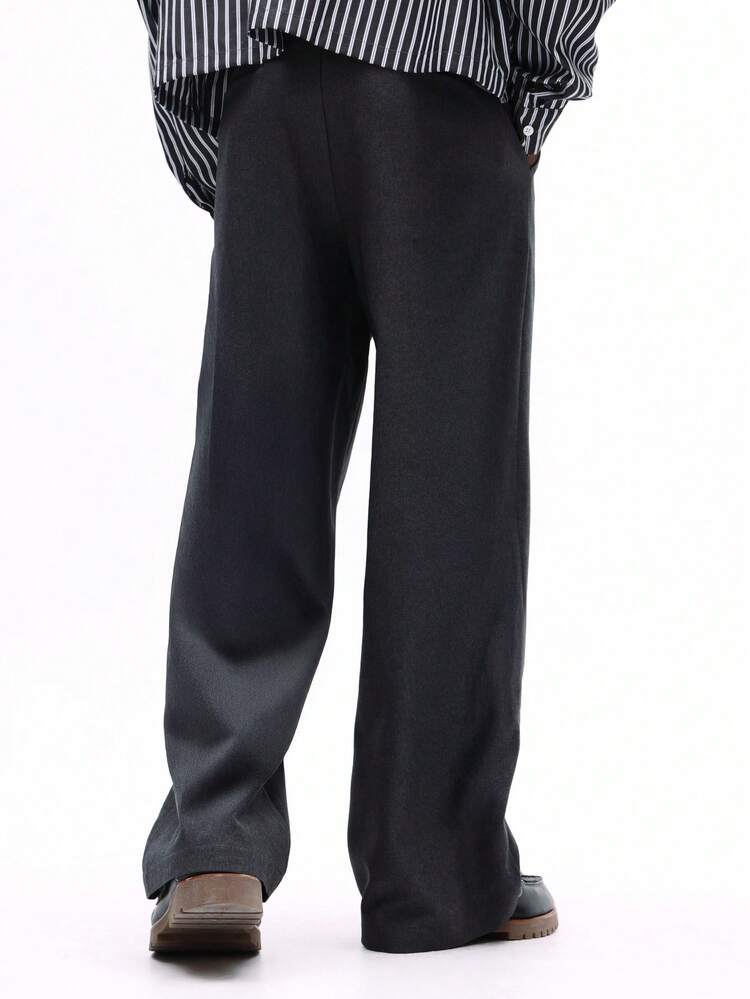 Pantalon habillé à jambes larges plissé