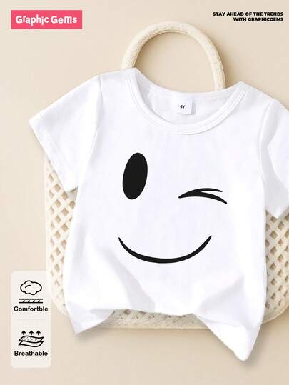GraphicGems Young Boy Wink Smiling Face Print Casual Round Neck Short Sleeve T-Shirt, Summer