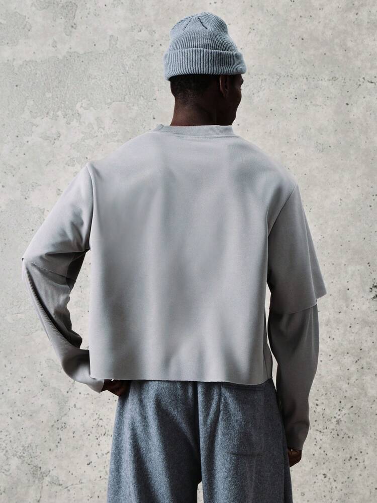 T-shirt oversize a maniche lunghe con scollo rotondo e logo