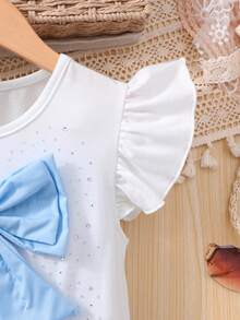 Sparklyn Đầm cho bé gái tuổi teen, áo dệt kim màu trắng tay phồng, điểm nhấn là nơ hồng đính đá, chân váy xếp tầng màu hồng, thiết kế xếp ly, kiểu dáng dễ thương phù hợp đi học mùa hè. - Màu xanh lam - Xem 6