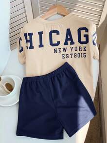 SHEIN Set de 2 piezas de top de manga corta con gráfico de letras y pantalones cortos de cintura elástica, estilo coreano casual y lindo para bebé niño en verano