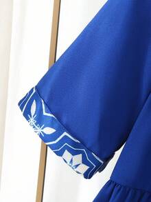 SHEIN Áo Jalabiya màu xanh hải quân họa tiết hoa cho bé gái, kiểu dáng thanh lịch cổ điển thêu hoa, váy dài tay truyền thống tối giản kiểu Ả Rập cho bé gái, phù hợp cho mùa xuân/hè, váy dài tay kín đáo, áo Abaya cầu nguyện, thoải mái dễ chịu, trang phục thường ngày, phong cách nghỉ dưỡng, áo Kaftan kín đáo, áo Jalabiya cho bé gái, áo Jalabiya cho bé gái (kèm túi đeo chéo). - Màu xanh lam - Xem 6