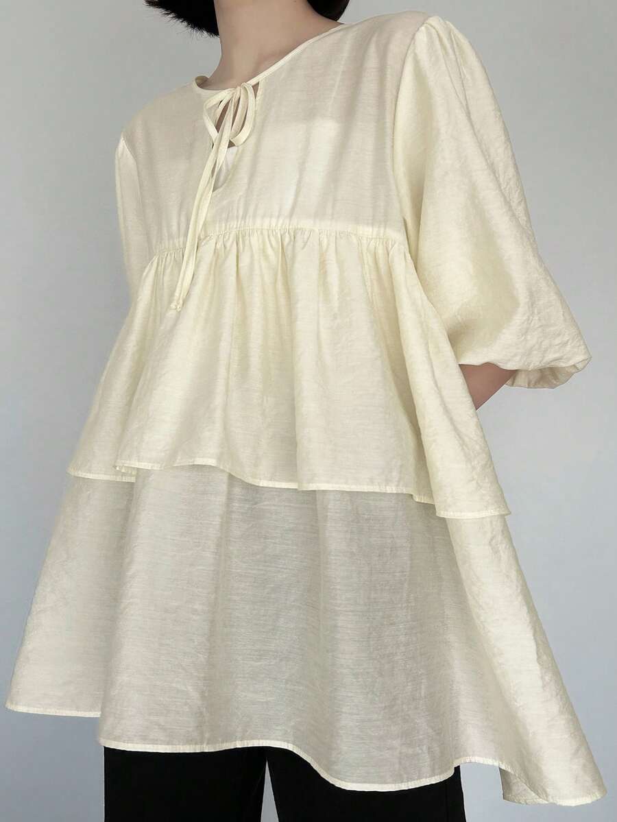 FRIFUL Women's Round Neck Criss-Cross Tie Hem Layered Ruffle Petal Sleeve Blouse - Beige - View 1