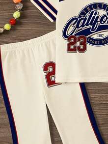 SHEIN 女童数字字母印花圆领短袖T恤和喇叭裤套装，休闲街头风，适合上学、运动、户外野餐、休闲外出、街头摄影、居家穿着。