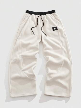 Street Life Pantaloni casual da uomo con stampa a lettere, vita con coulisse e tasche, vestibilità ampia e gamba larga, versatili per l'uso quotidiano