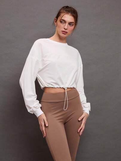 بلوزة رياضية نسائية بياقة طاقم وأكمام طويلة وخصر مربوط بسحاب، قصيرة الطول