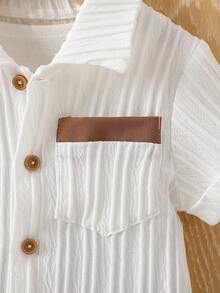 男婴纯色 Polo 领口袋衬衫上衣和短裤两件套。修身设计，适合各种宝宝体型。适合日常外出、居家休闲、公园玩耍、运动跑步等，是妈妈们为宝宝夏季衣橱必备的时尚单品。 - 彩色 - 查看 7