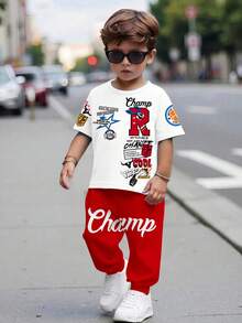 SHEIN 2 pezzi/set Ragazzo giovane, top a maniche corte e pantaloni casual minimalisti con collo rotondo, stile classico e fresco da strada con stampa grafica, stampa del logo Champion, adatto per primavera/estate - Multicolore - Visualizzare 2