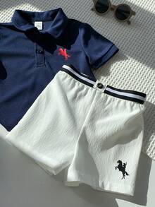 SHEIN 2件套男宝宝可爱学院风经典Polo衫短裤套装，适合休闲外出、室内活动、生日派对、晚宴、婚礼、迎婴派对、洗礼和一周岁生日庆祝，春夏款。 - 藏蓝色 - 查看 5