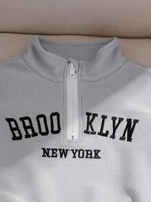 两件套针织华夫格纹理半拉链前开襟刺绣英文文字短袖上衣和短裤，时尚休闲日常穿着