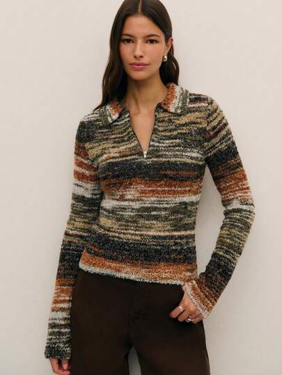 Nöista 这款柔软针织毛衣采用 Polo 领和 V 领设计，质地蓬松，保暖舒适，是春假期间的理想之选。修身剪裁凸显身材，优雅百搭，可轻松搭配裤装或牛仔裤，打造舒适又不失精致的造型。