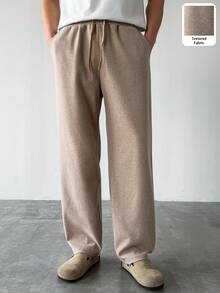 HUEFORM 男士卡其色成熟宽松休闲裤，面料挺括，剪裁利落。适合户外活动和居家休闲穿着。 - 卡其色 - 查看 1